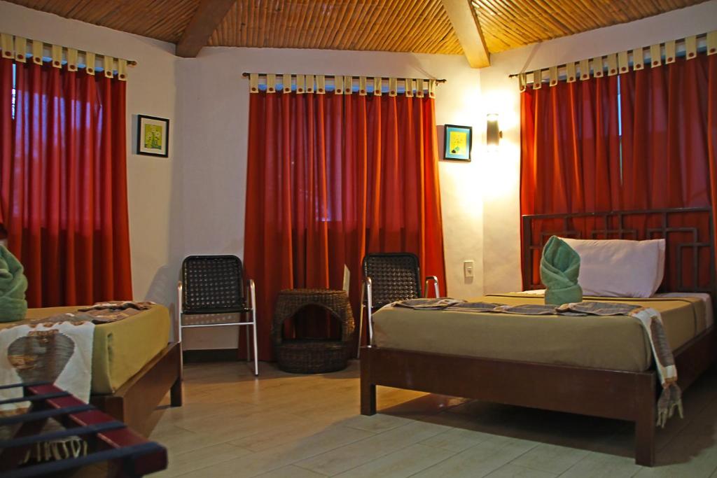 Postel nebo postele na pokoji v ubytování Coron Hilltop View Resort