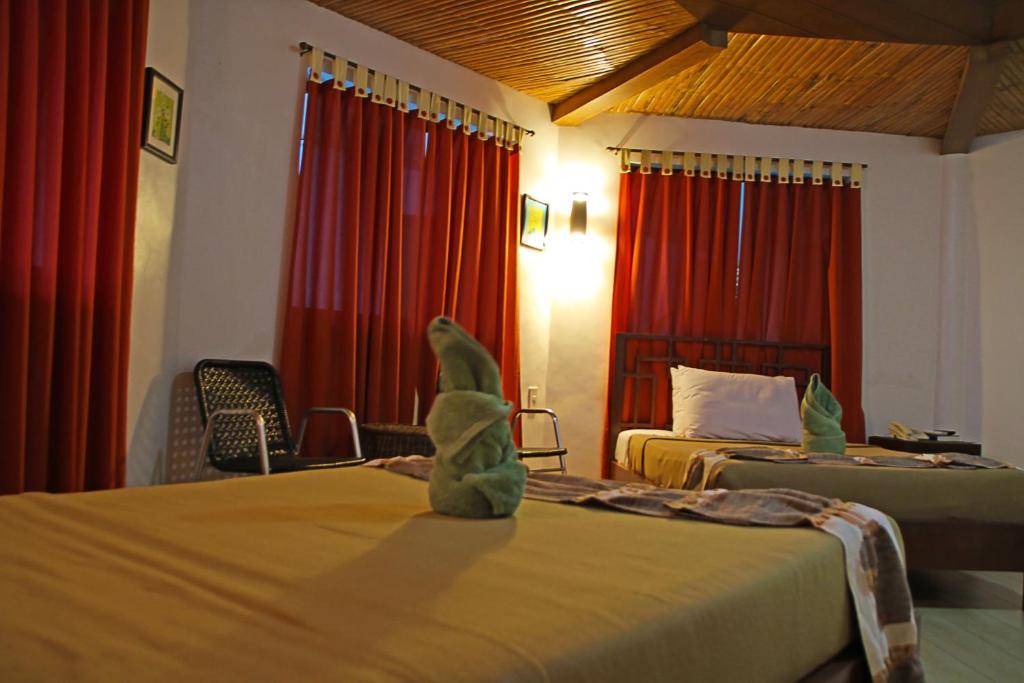 Postel nebo postele na pokoji v ubytování Coron Hilltop View Resort