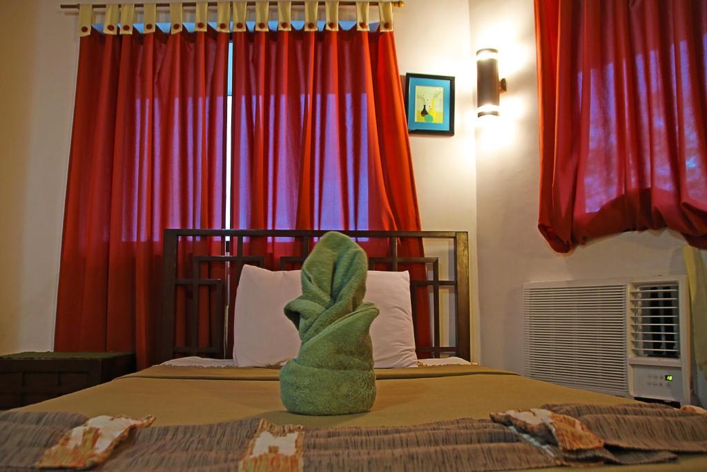 Postel nebo postele na pokoji v ubytování Coron Hilltop View Resort