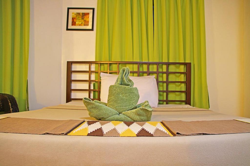 Postel nebo postele na pokoji v ubytování Coron Hilltop View Resort