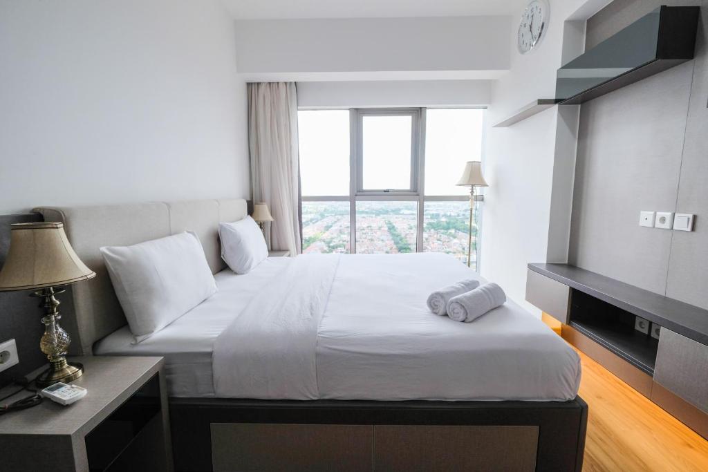 1BR Midtown Signature Apartment with Sofa Bed By Travelio (Indoneesia  Tangerang) - Booking.com