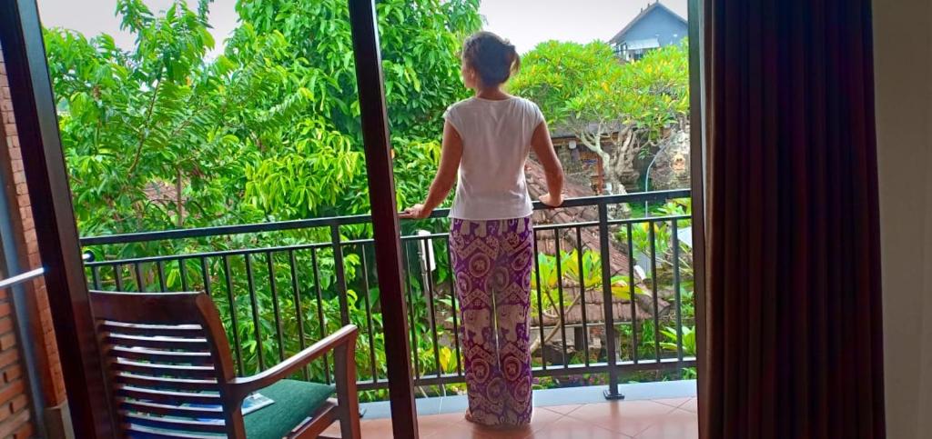 Balkón nebo terasa v ubytování Ubud Taksu Homestay