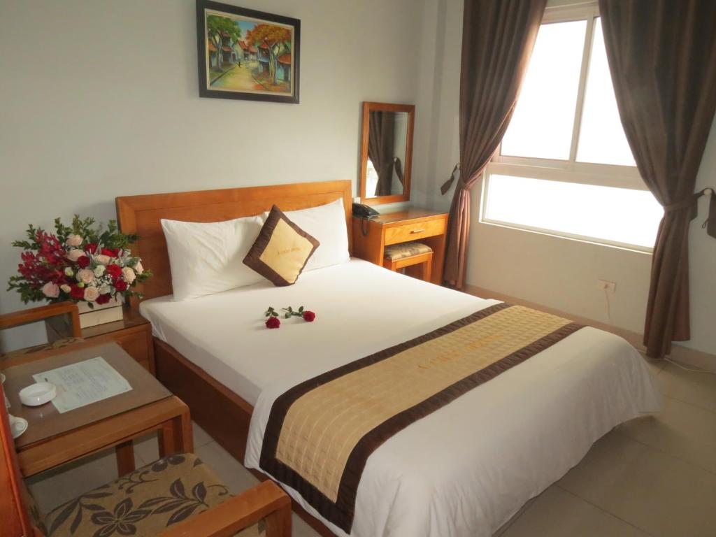 Postel nebo postele na pokoji v ubytování Green Hotel
