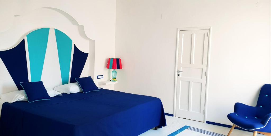 Postel nebo postele na pokoji v ubytování Boutique Suites in Piazzetta