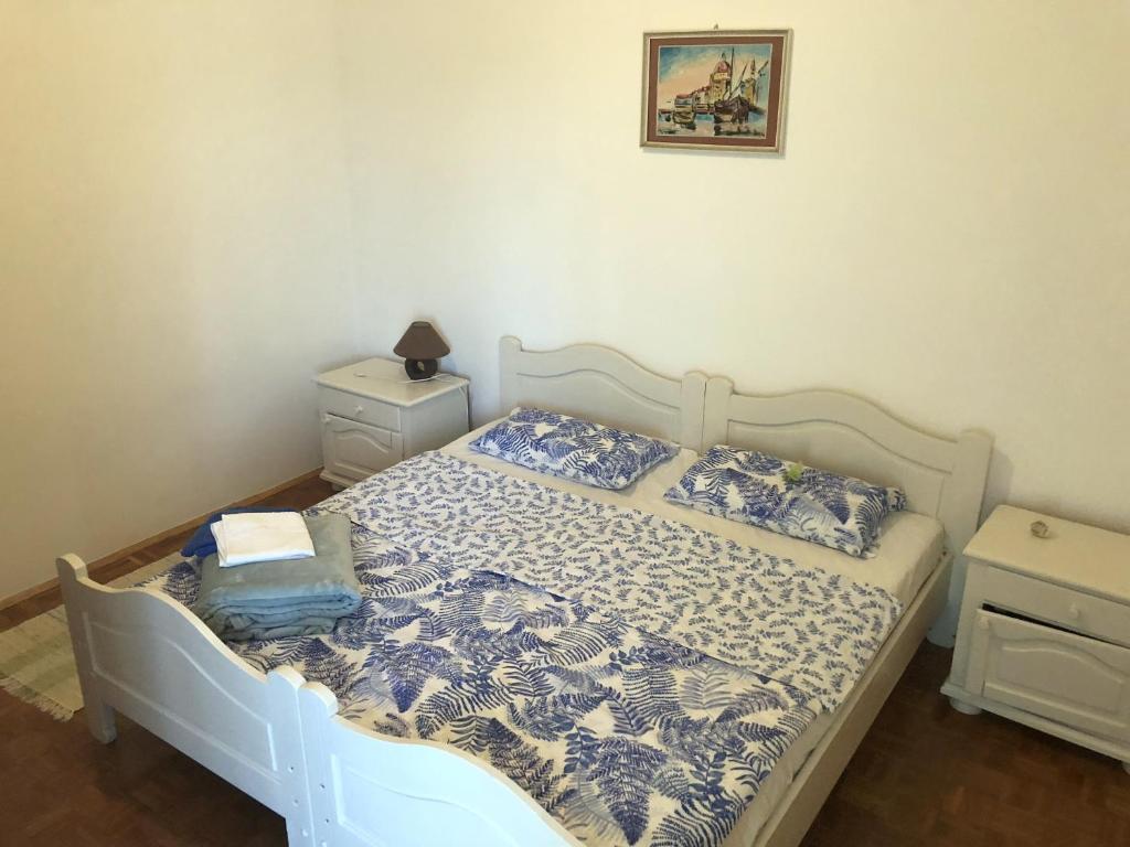 Postel nebo postele na pokoji v ubytování Guesthouse Vila Ruzmarin