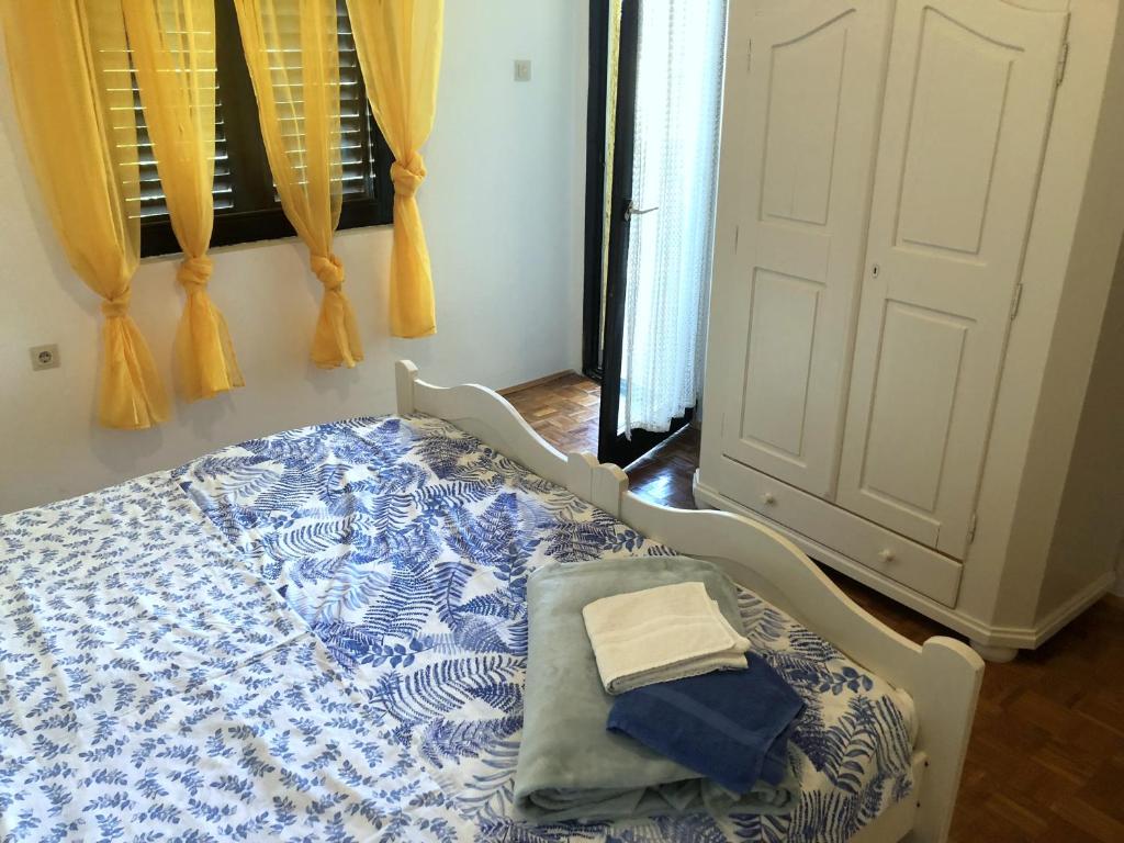 Postel nebo postele na pokoji v ubytování Guesthouse Vila Ruzmarin