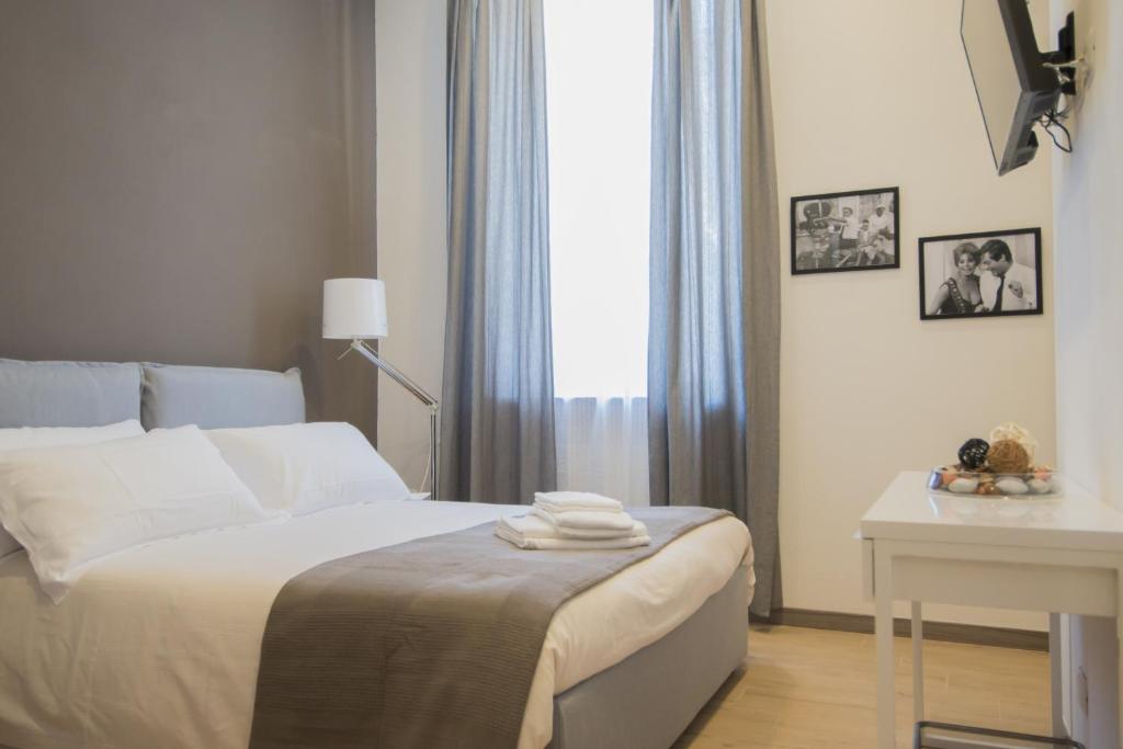 Postel nebo postele na pokoji v ubytování Ca'Vour