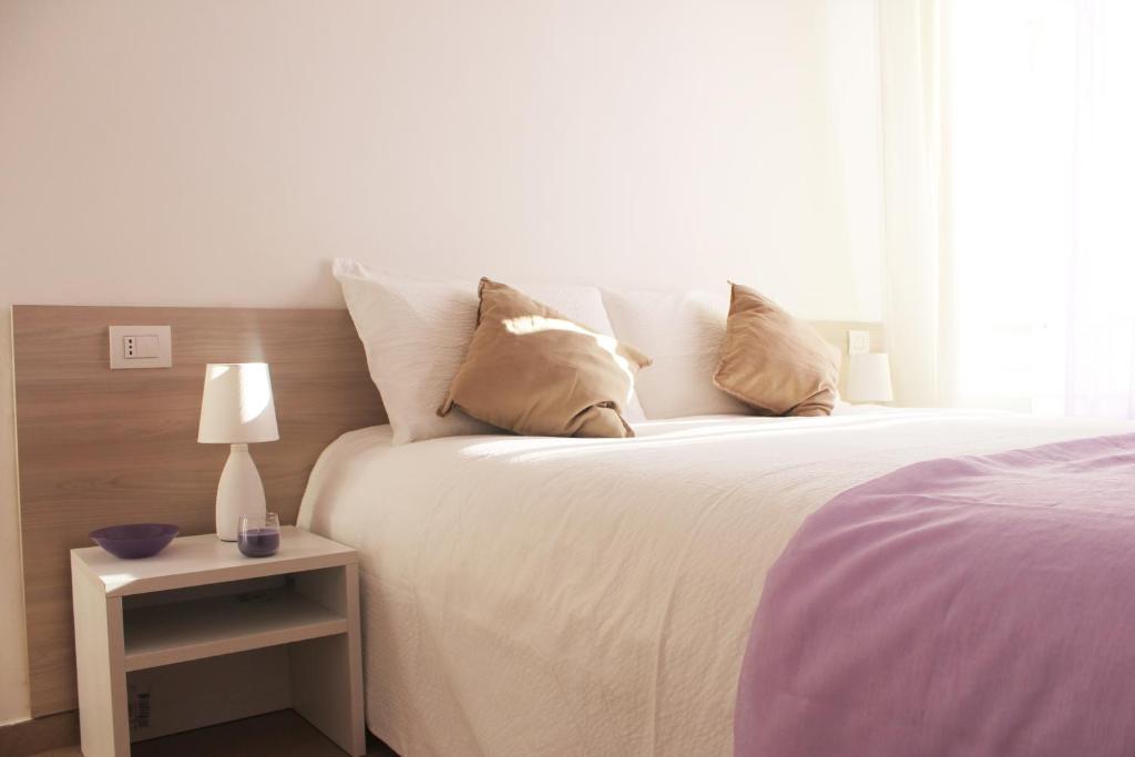 A bed or beds in a room at Agriturismo La dimora dei Re
