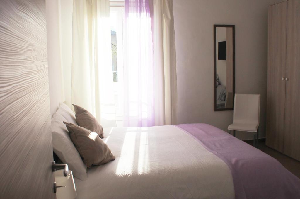 A bed or beds in a room at Agriturismo La dimora dei Re