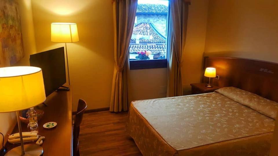 Postel nebo postele na pokoji v ubytování Hotel Purlilium