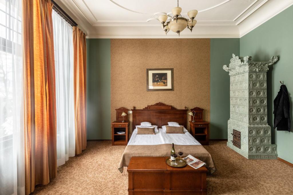 Postel nebo postele na pokoji v ubytování Villa Elise Park Pension