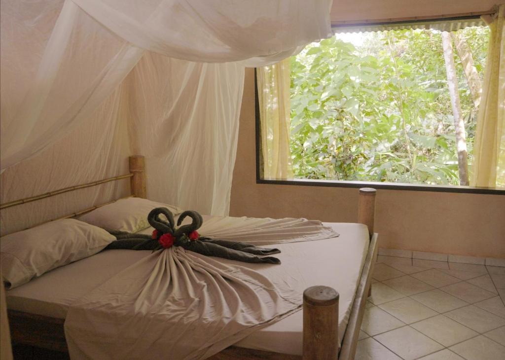 Postel nebo postele na pokoji v ubytování Amazonita Ecolodge
