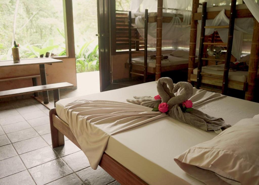 Postel nebo postele na pokoji v ubytování Amazonita Ecolodge