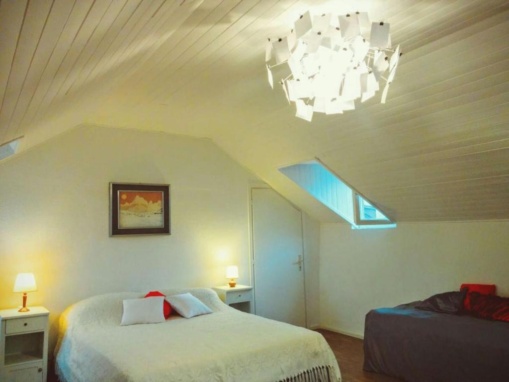 Кровать или кровати в номере Ugo Architect's Bright Loft