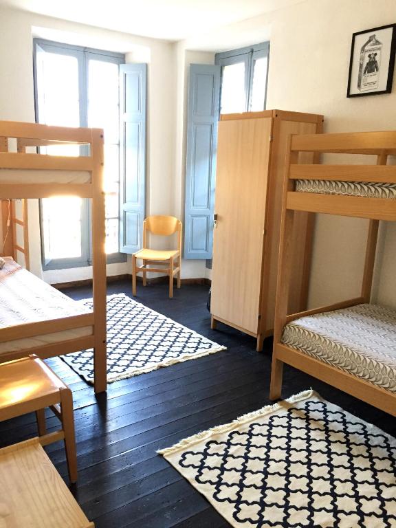 Postel nebo postele na pokoji v ubytování Gîte du Chalet Pietri