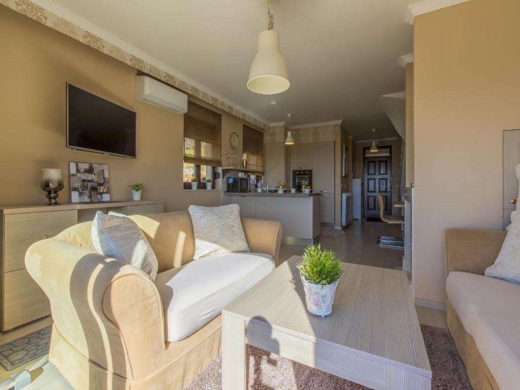 Televízia a/alebo spoločenská miestnosť v ubytovaní Apartment PEZ