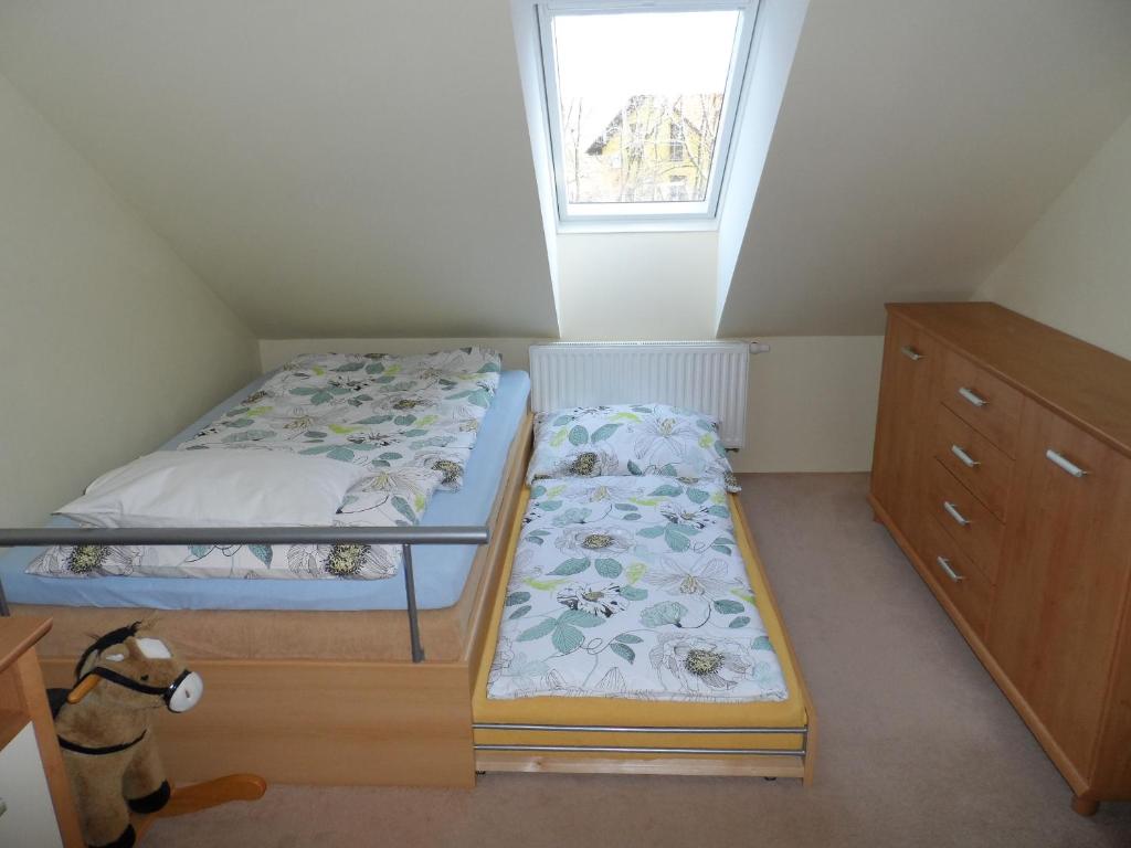 Postel nebo postele na pokoji v ubytování Apartmán Ludmila