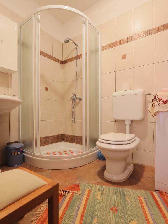 Koupelna v ubytování Apartments Nives NB