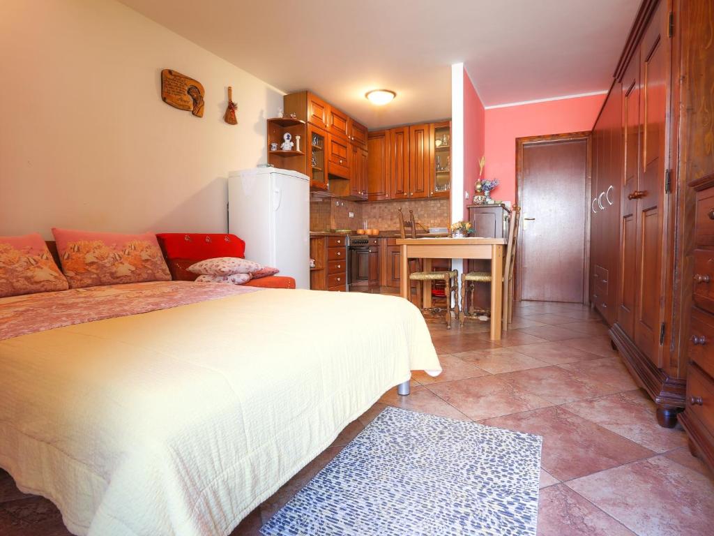 Postel nebo postele na pokoji v ubytování Apartments Nives NB