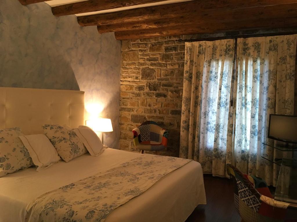 Cama o camas de una habitación en Los Arcos