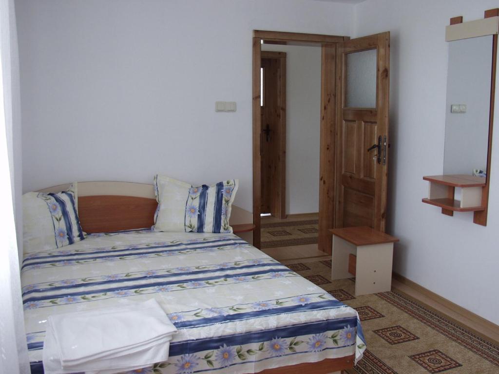 Ένα ή περισσότερα κρεβάτια σε δωμάτιο στο Стаи за гости "Нина"