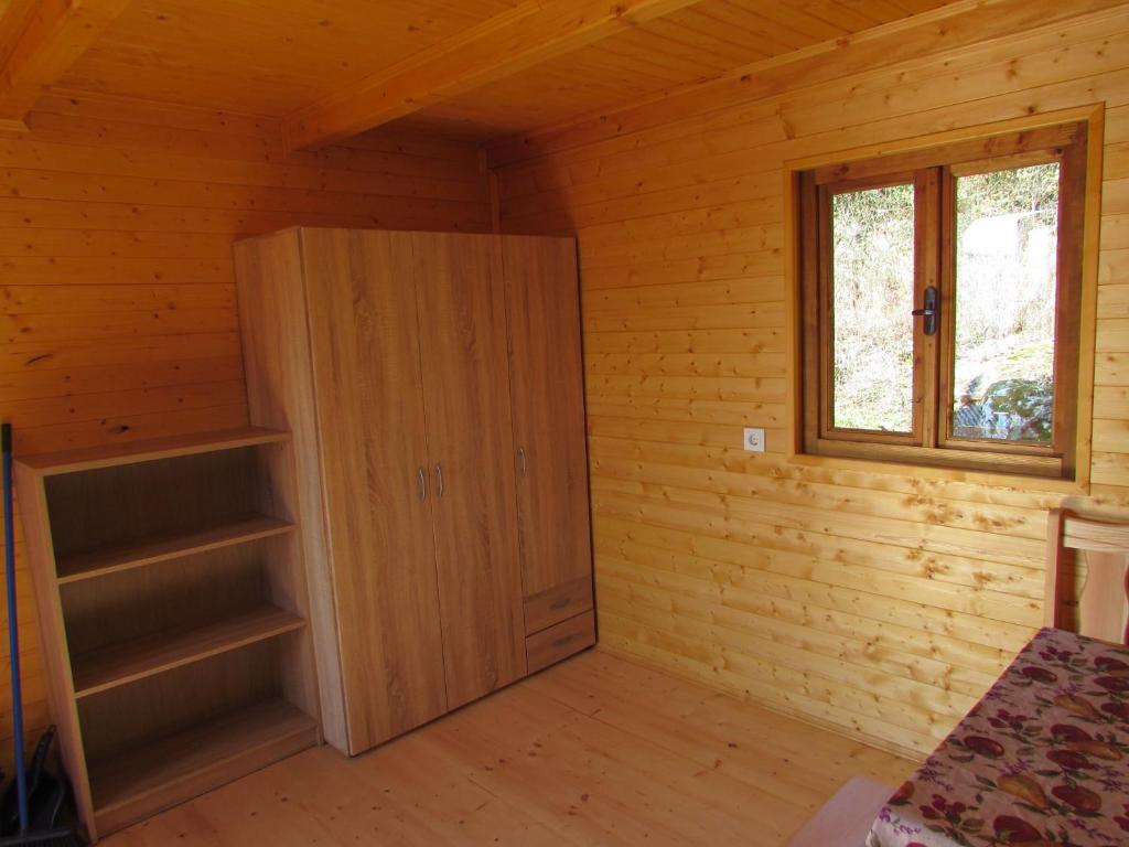 Postel nebo postele na pokoji v ubytování Rybářská Chata U Sumce