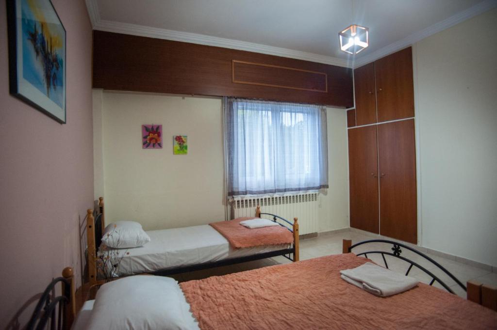 Posteľ alebo postele v izbe v ubytovaní Retro Chic Apartment