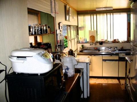 Kuchyň nebo kuchyňský kout v ubytování Buddha Guest House