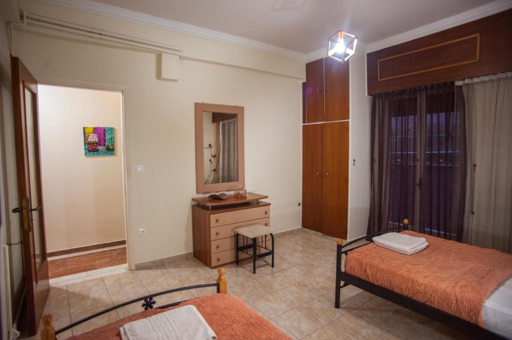 Posteľ alebo postele v izbe v ubytovaní Retro Chic Apartment