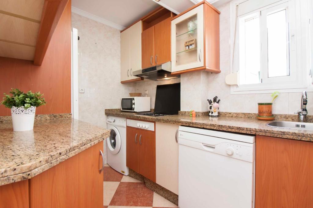 Kuchyňa alebo kuchynka v ubytovaní Malaga Center Flat Hospitality