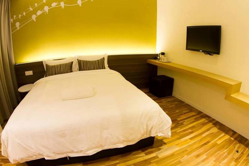 TV a/nebo společenská místnost v ubytování Mood Hotel