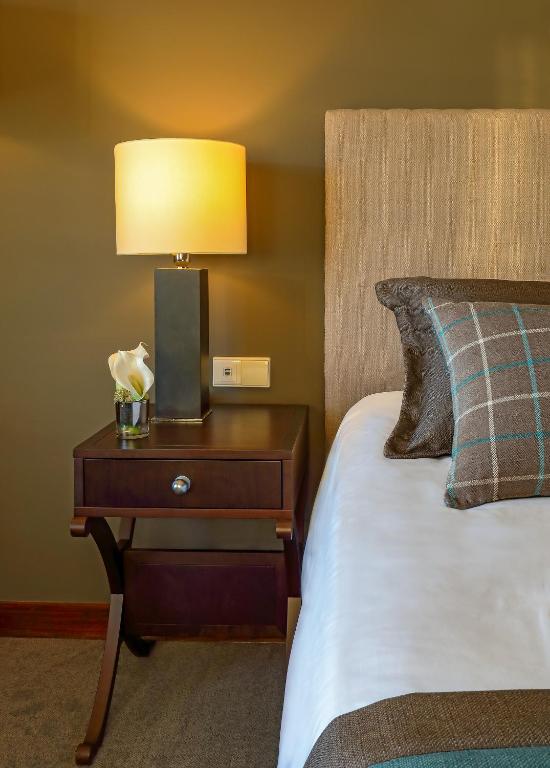 Uma cama ou camas num quarto em Santarem Hotel