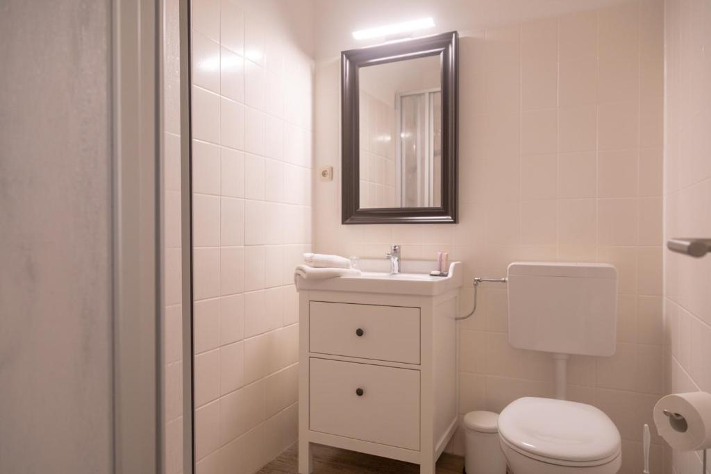 Koupelna v ubytování Heeren's Hotel Garni
