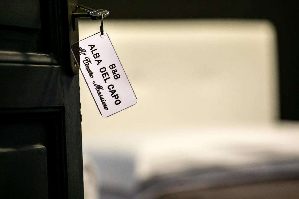 Una cama o camas en una habitación de ALBA DEL CAPO