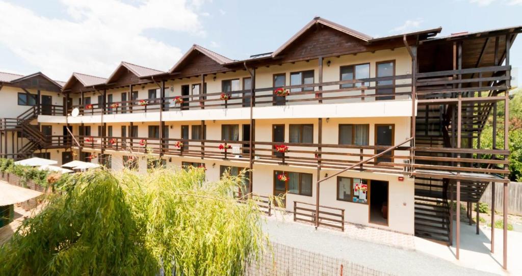 a row of buildings with balconies at Hostel Sea Star in Vama Veche