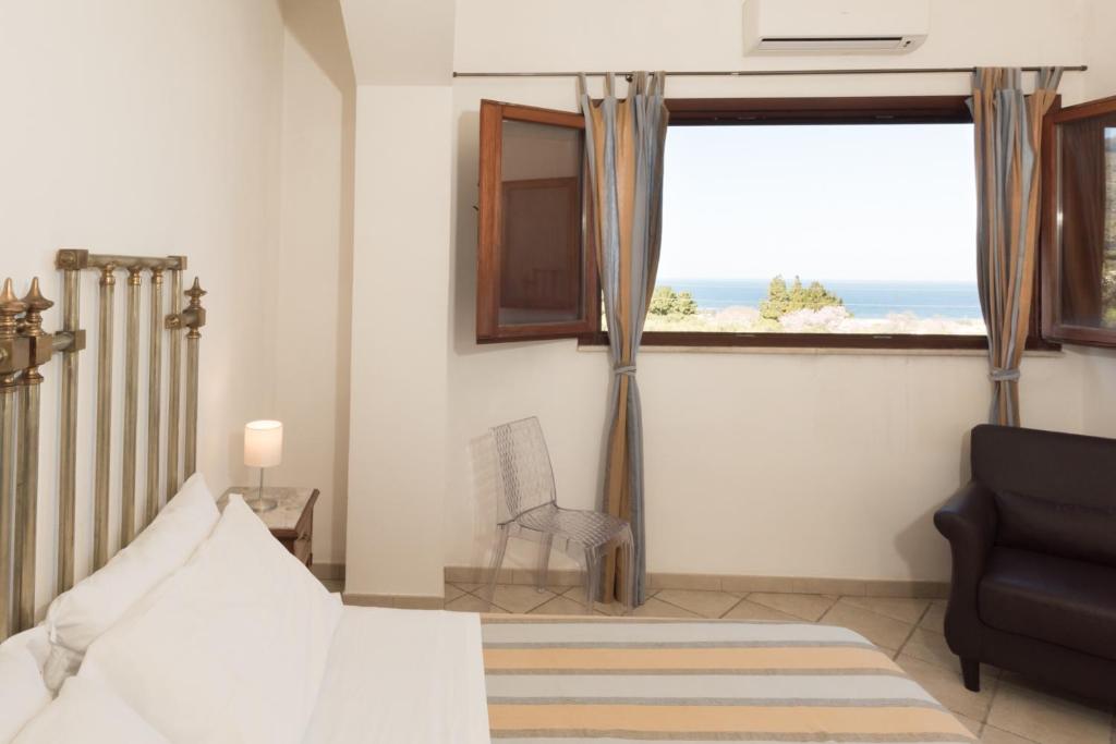 Postel nebo postele na pokoji v ubytování Casale Belvedere vista mare