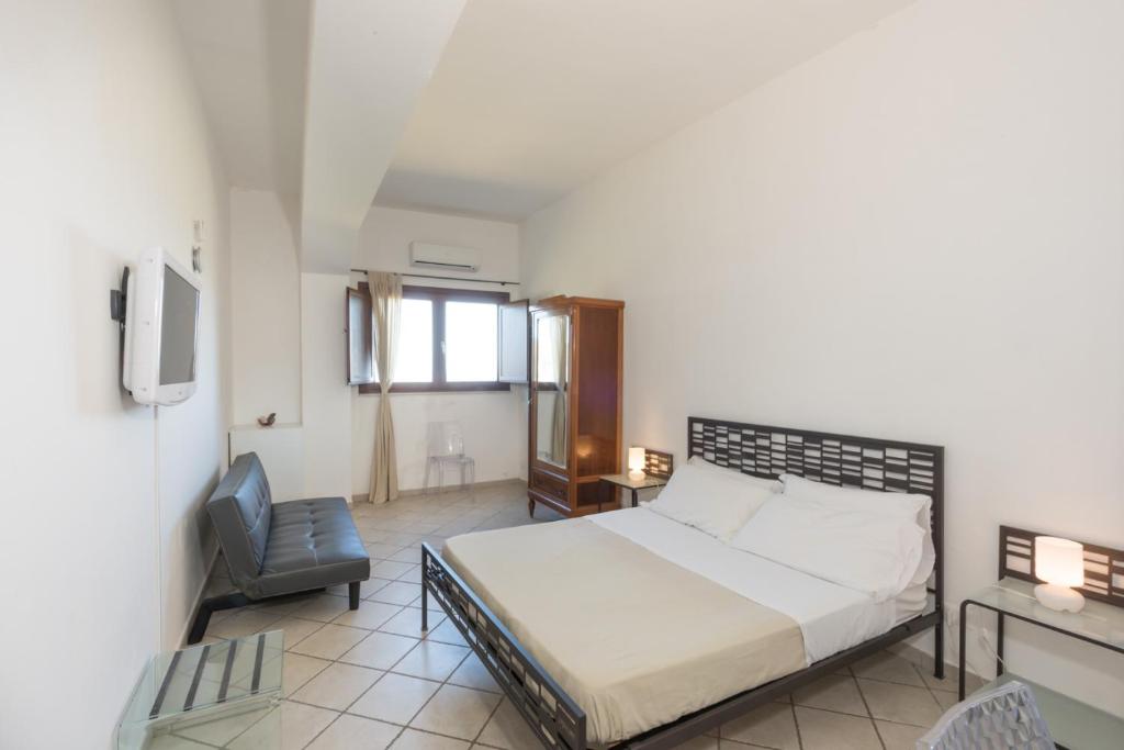 Postel nebo postele na pokoji v ubytování Casale Belvedere vista mare