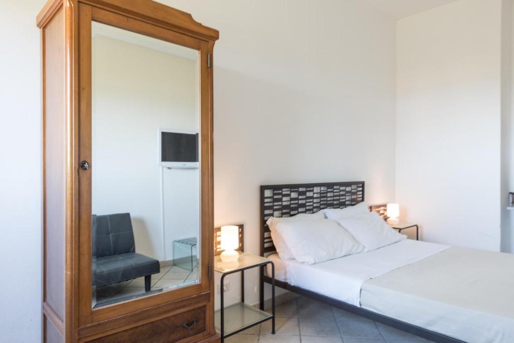 Postel nebo postele na pokoji v ubytování Casale Belvedere vista mare