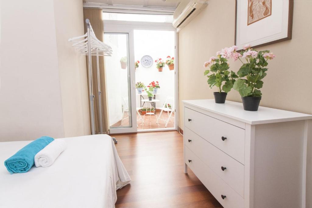 Posteľ alebo postele v izbe v ubytovaní Malaga Center Flat Comedias Street
