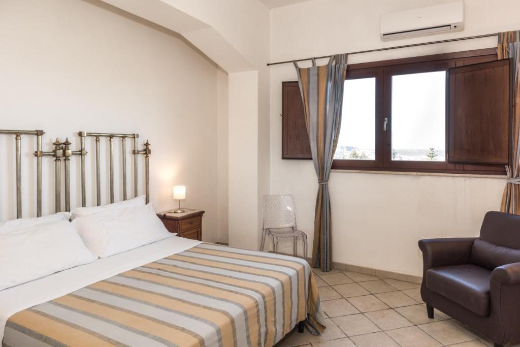 Postel nebo postele na pokoji v ubytování Casale Belvedere vista mare