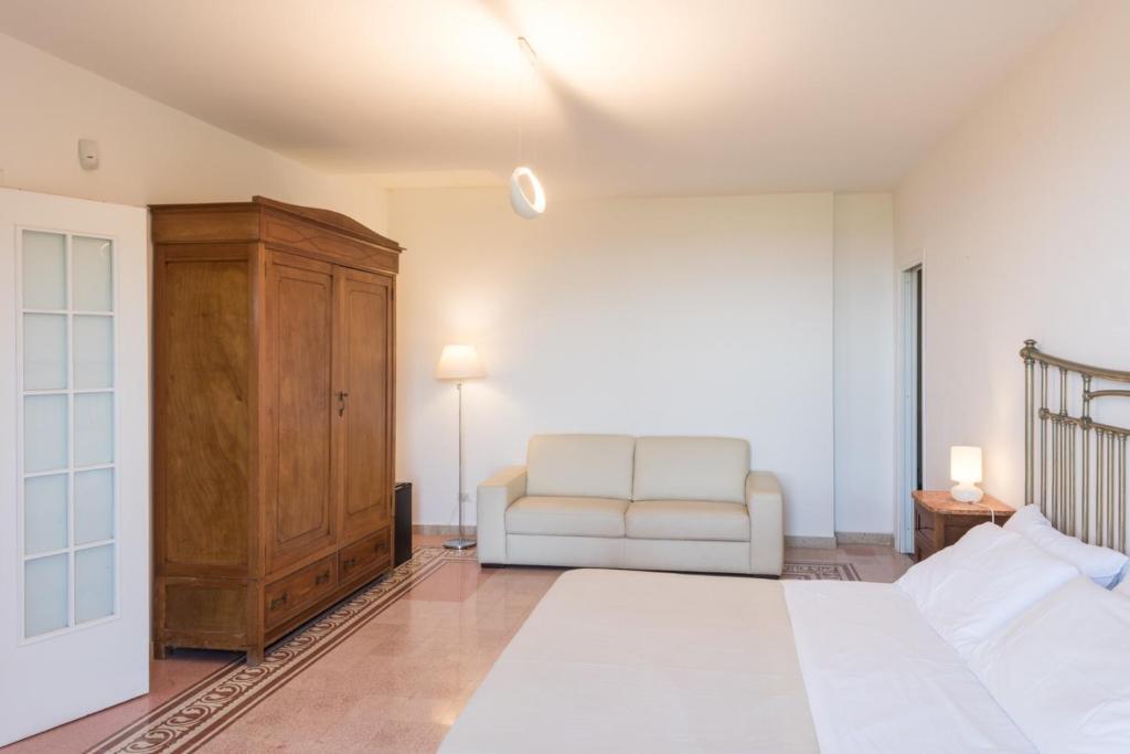 Postel nebo postele na pokoji v ubytování Casale Belvedere vista mare