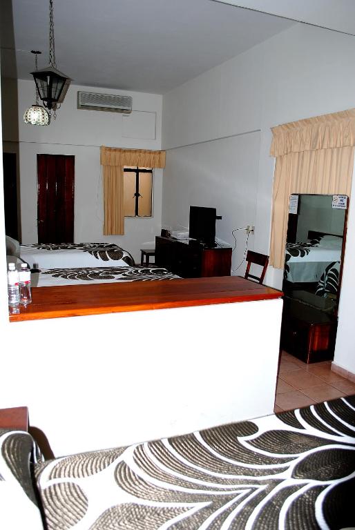 Postel nebo postele na pokoji v ubytování HOTEL POSADA DEL SOL