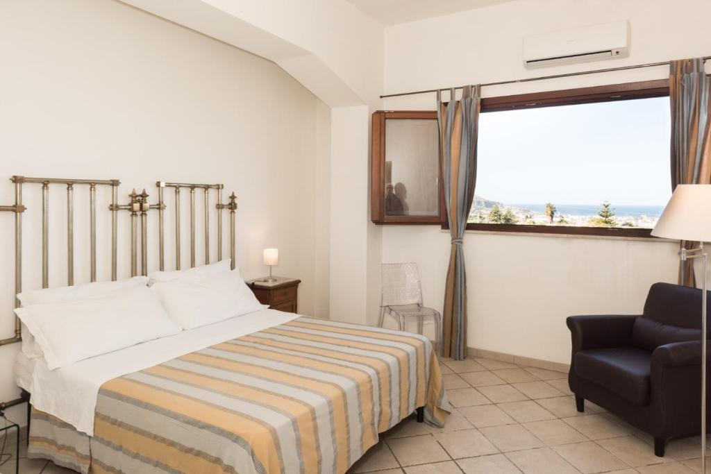 Postel nebo postele na pokoji v ubytování Casale Belvedere vista mare