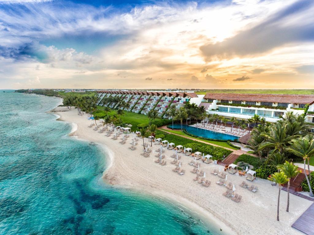 an aerial view of the beach at the excellence punta cana resort at Grand Velas Riviera Maya - All Inclusive in Playa del Carmen