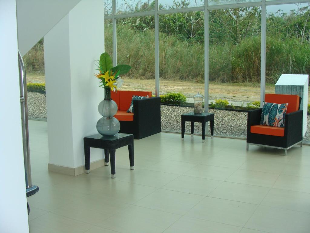 Posezení v ubytování Apartamento en BalaBeach María Chiquita in front of the beach 2hab