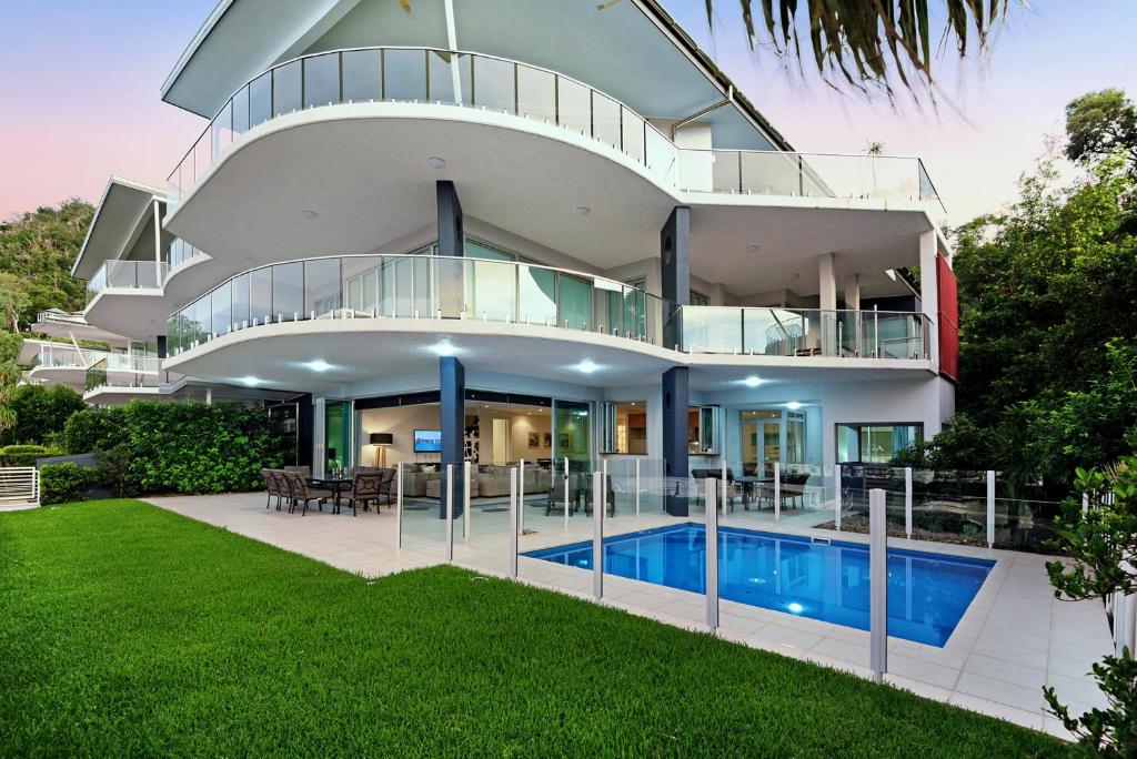 an image of a house with a swimming pool at Pavillions on Hamilton Island in Hamilton Island