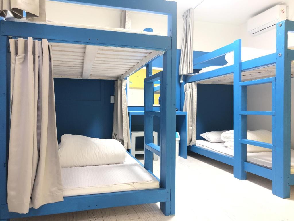Postel nebo postele na pokoji v ubytování Slow Citi Guest House -슬로시티게스트하우스