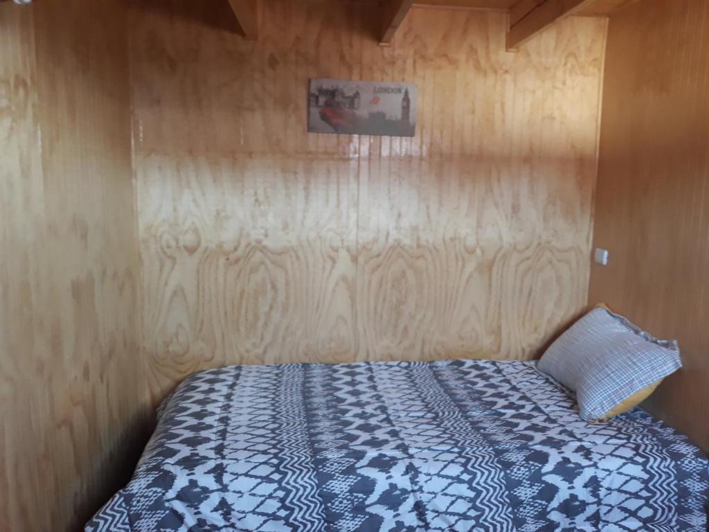 Postelja oz. postelje v sobi nastanitve Hostal Doña Tamy