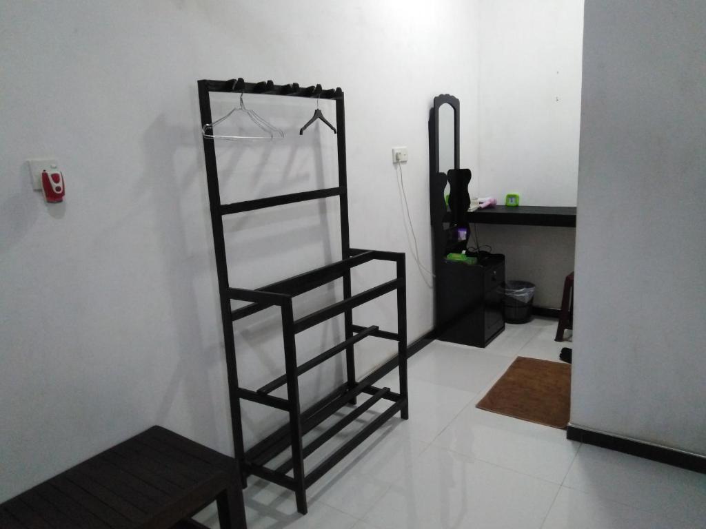 Postel nebo postele na pokoji v ubytování Asiri HomeStay