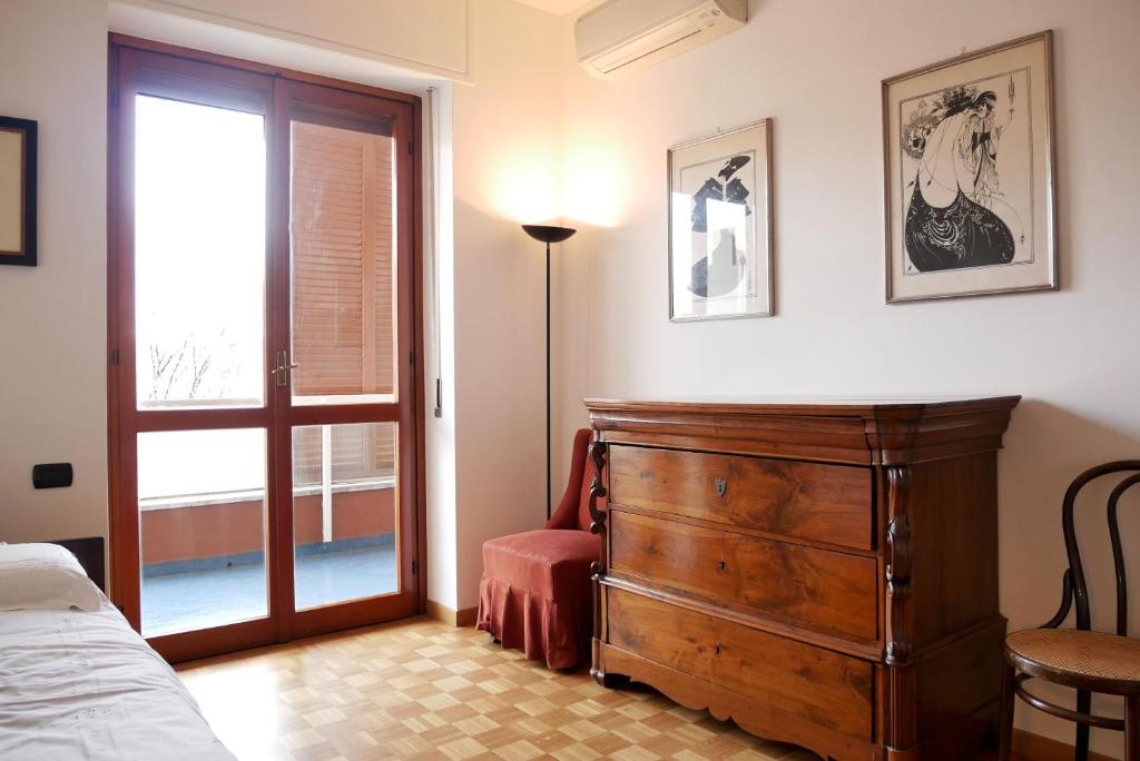 Posteľ alebo postele v izbe v ubytovaní CaseOspitali - Casa Alberata, trilocale nel verde a pochi minuti dal San Raffaele
